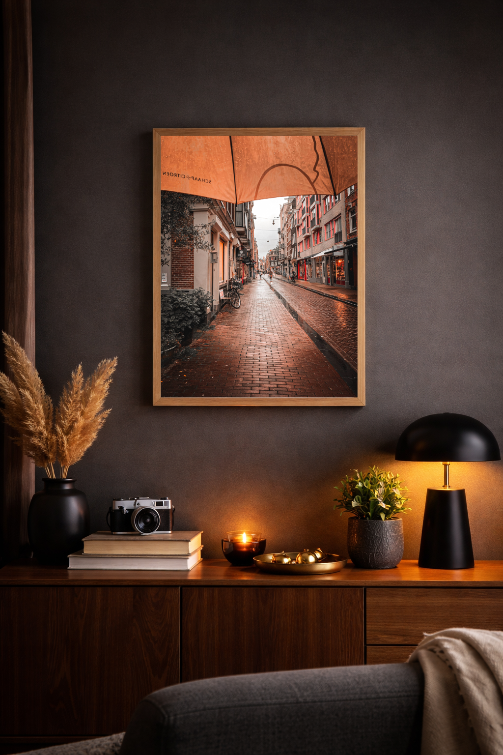 Amsterdam wall art featuring a rain soaked street scene with warm reflections after rainfall.