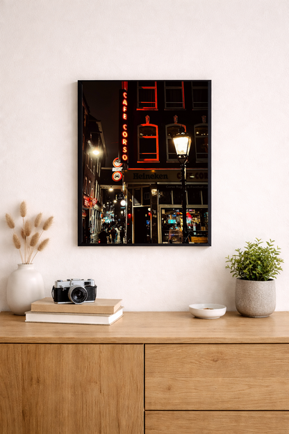 Amsterdam wall art capturing city lights and nightlife after dark.