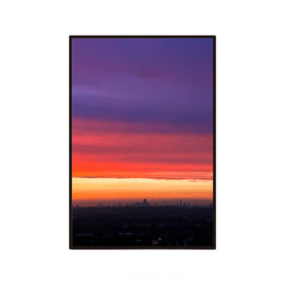 Sunset sky wall art featuring vibrant colours and a glowing horizon.