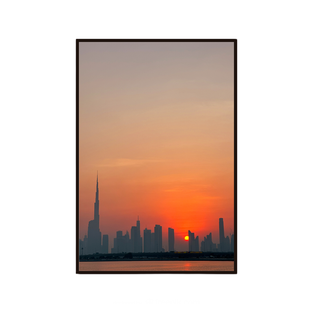 Dubai wall art featuring a dramatic sunset over the city skyline.