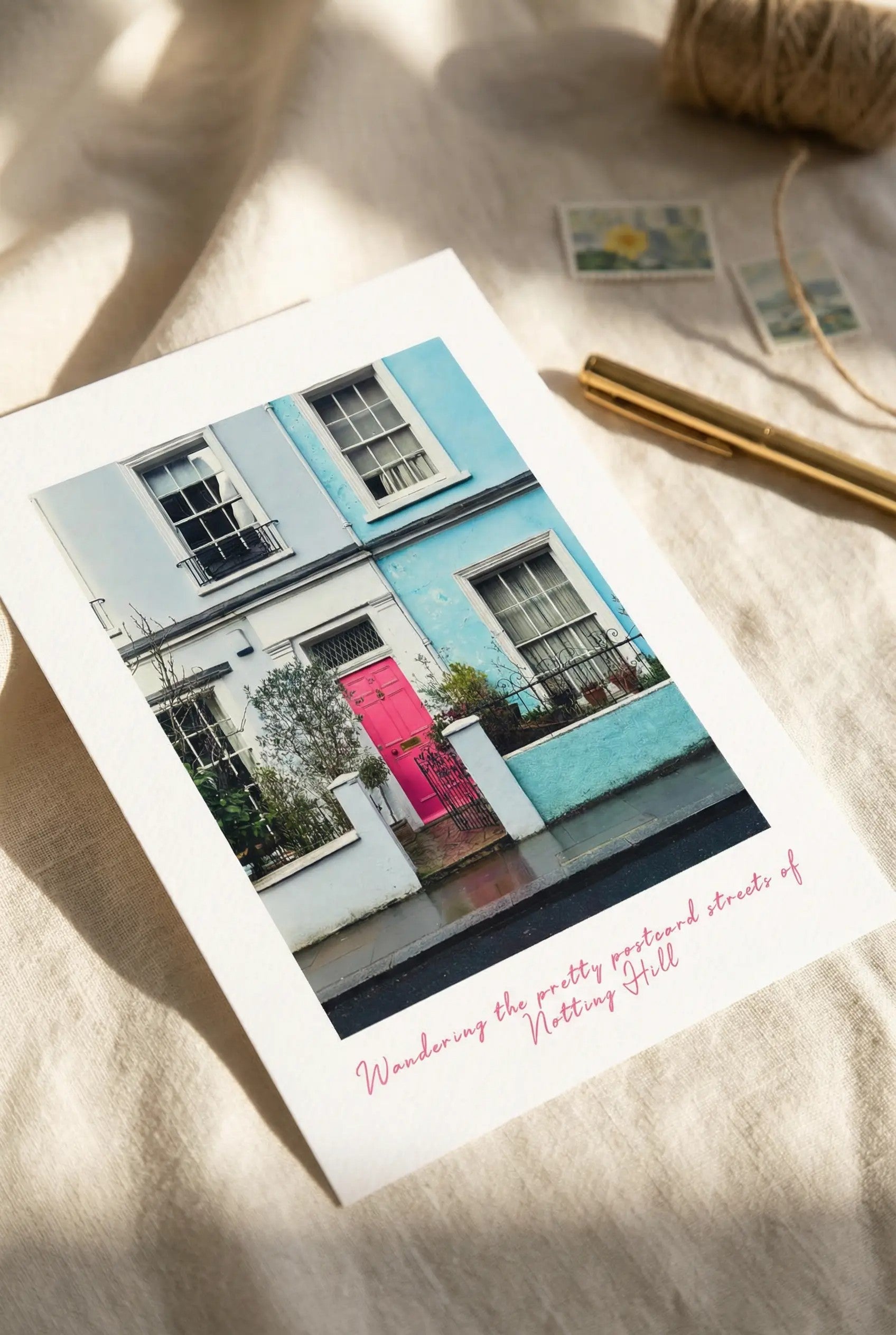 Close up of the Notting Hill postcard featuring colourful London architecture.