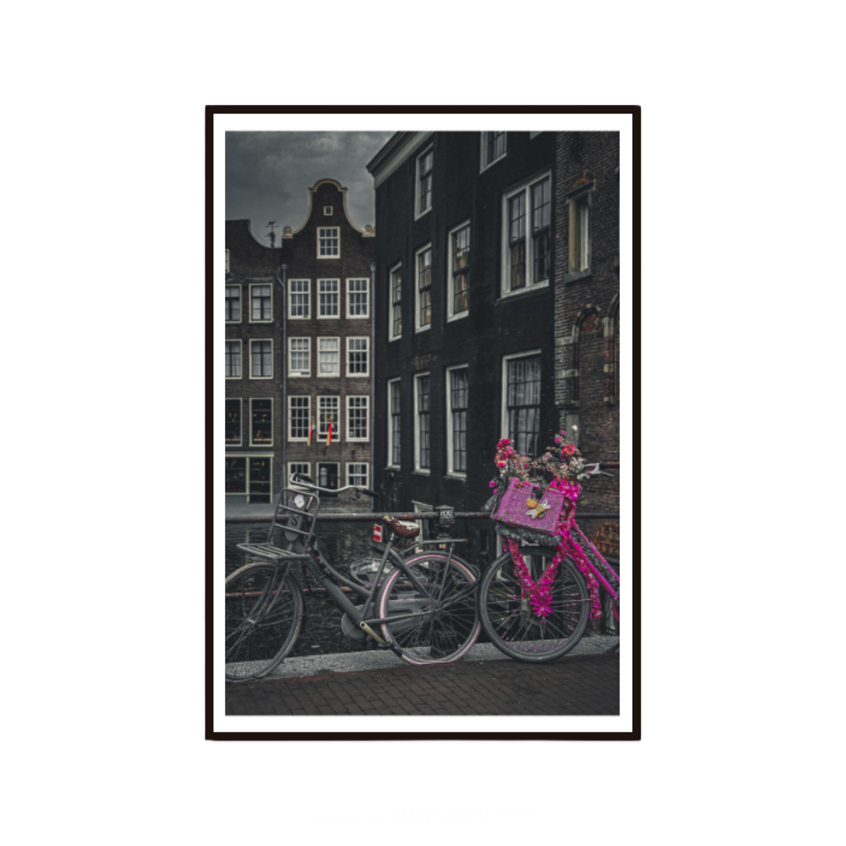 Amsterdam wall art featuring a vintage pink bicycle beside historic canal houses.