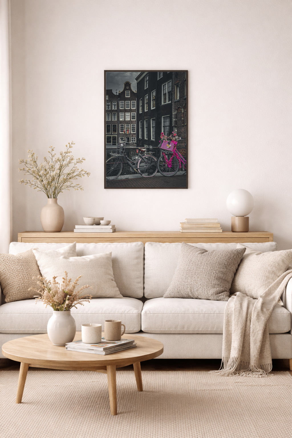 Amsterdam wall art featuring a vintage pink bicycle beside historic canal houses.