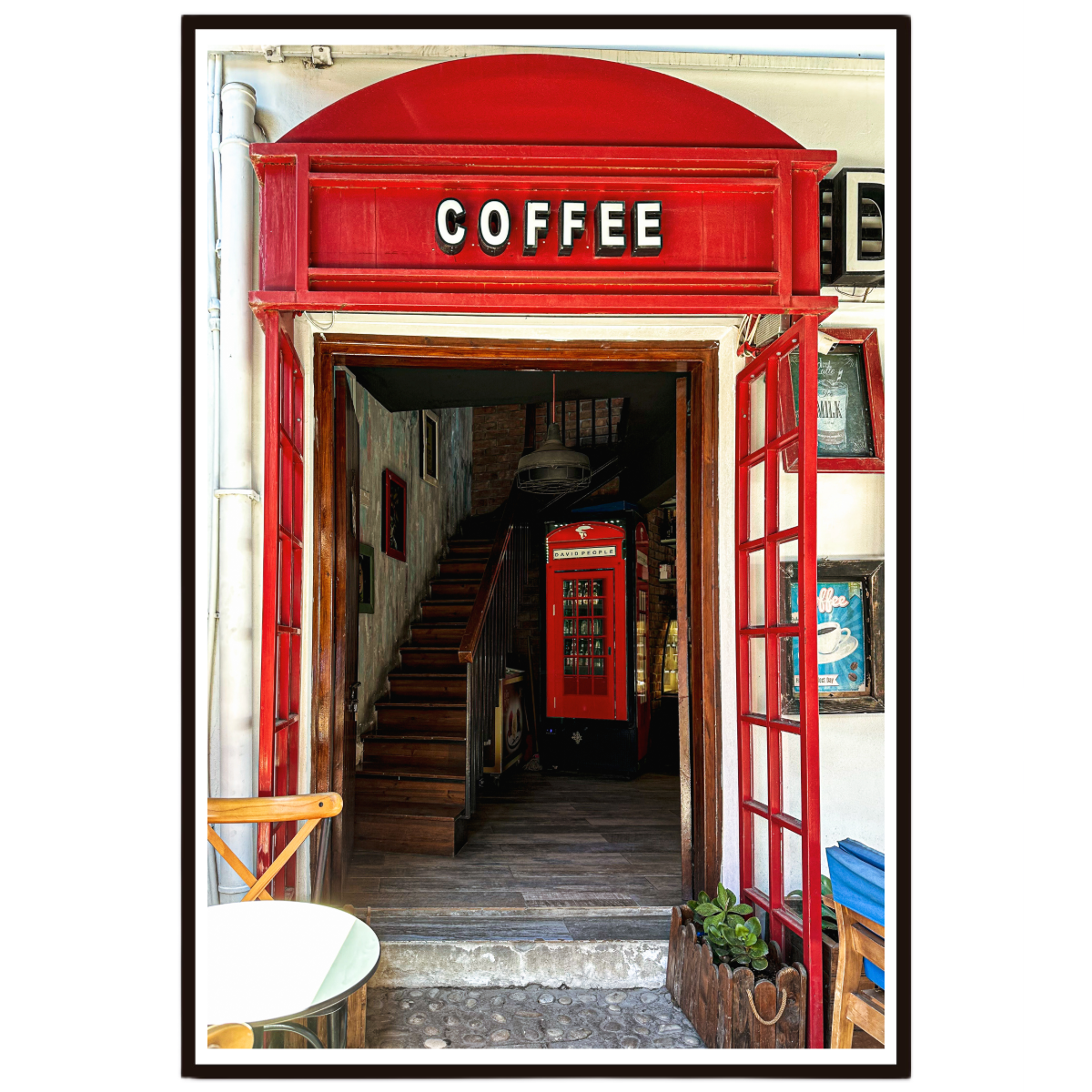 Cafe inspired wall art featuring a vibrant red entrance and charming European streetscape.